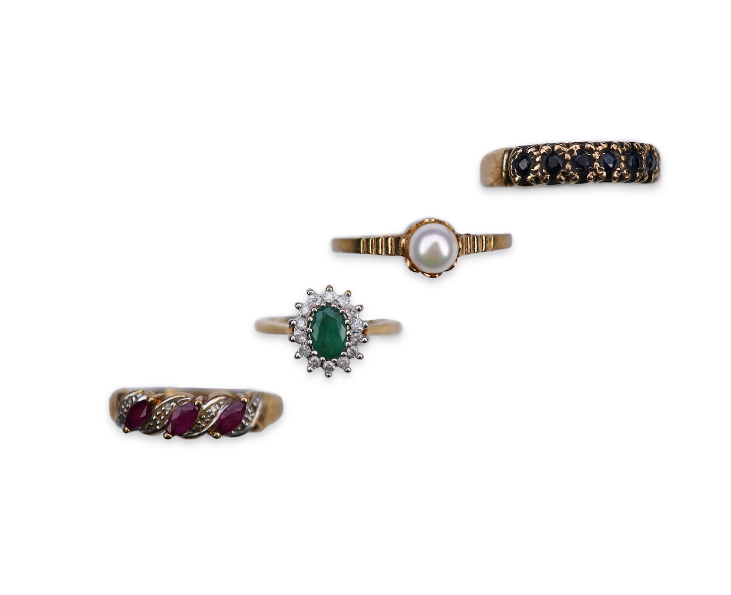 Four gem-set rings